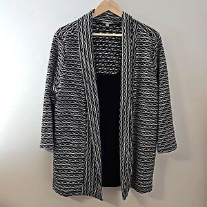 My collection is a woman's 2X black and white‎ classic top. Connected tank.